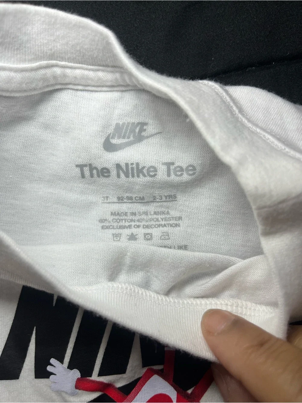 Nike White Kids Short Sleeve Tee with Black Logo and Red Graphic